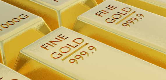 Close up of gold bars that say "Fine gold 999.9"